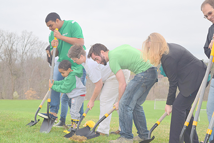 Community members at groundbreaking for playground in Fairview Park